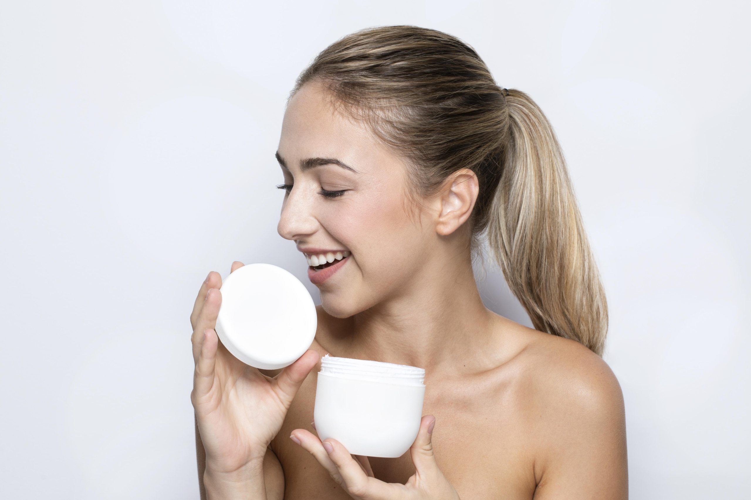 front-view-woman-with-beauty-product-concept